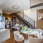 Apartment Verdi 1928, A Cozy Wallside Retreat